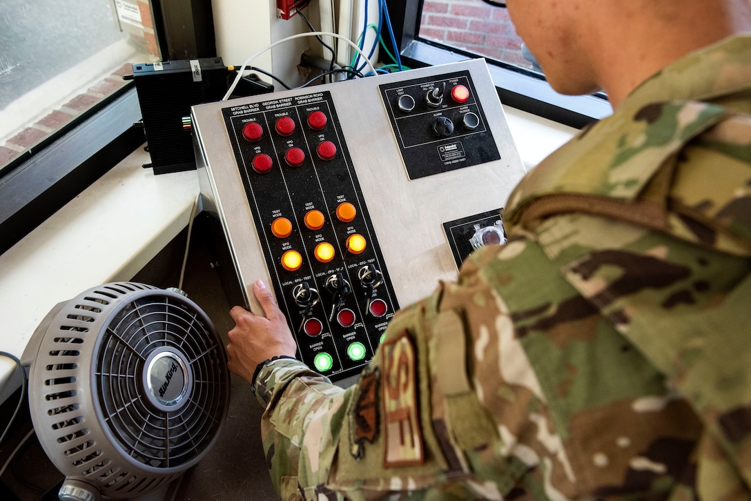 Airman 1st Class Steven Knox, 23d Security Forces Squadron installation entry controller, examines the barrier system control panel Oct. 2, 2019, at Moody Air Force Base, Ga. Installation entry controllers serve as the first line of defense, keeping Moody’s assets and personnel safe from potential threats. (U.S. Air Force photo by Senior Airman Erick Requadt)