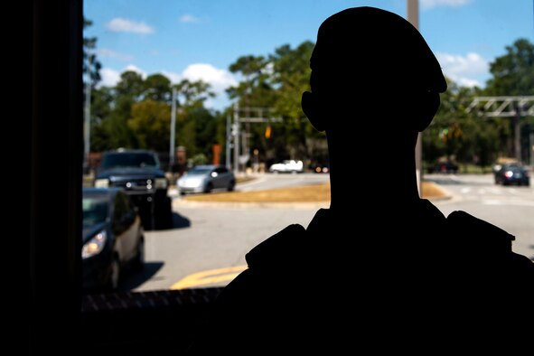 Airman 1st Class Steven Knox, 23d Security Forces Squadron installation entry controller, looks out at arriving vehicles Oct. 2, 2019, at Moody Air Force Base, Ga. Installation entry controllers serve as the first line of defense, keeping Moody’s assets and personnel safe from potential threats. (U.S. Air Force photo by Senior Airman Erick Requadt)