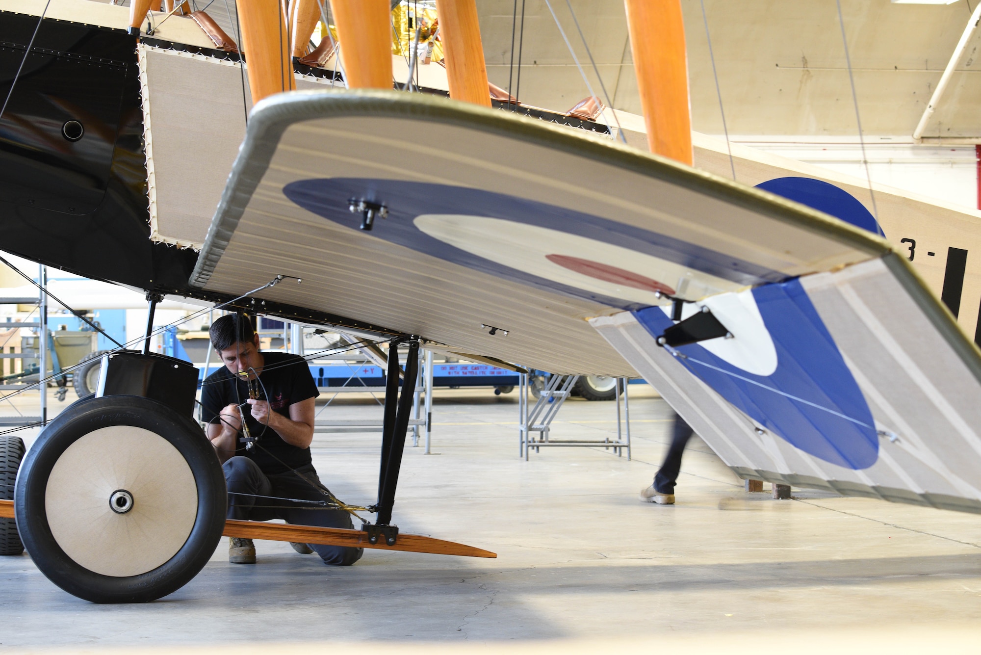 Biplane lower left wing work during restoration.