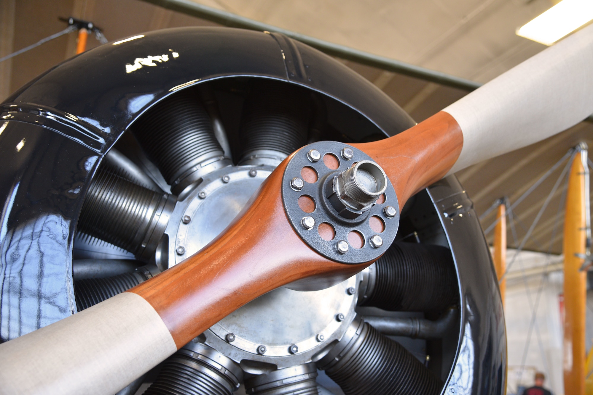 Propeller of a biplane being installed during restoration.