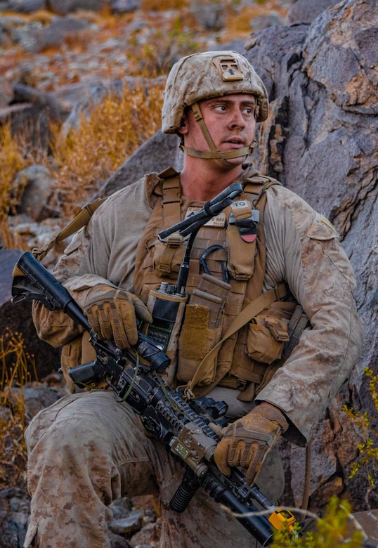 U.S. Marine Corps Lance Cpl. Trevor Kunz, a team leader with 3rd Light Armored Reconnaissance Battalion, 1st Marine Division, scans the surrounding area during a Marine Corps Combat Readiness Evaluation (MCCRE) at Marine Corps Air Ground Combat Center Twentynine Palms, California, Sept. 7, 2019. The MCCRE is used to formally evaluate Marines on their combat readiness prior to their upcoming deployment. (U.S. Marine Corps photo by Lance Cpl. Roxanna Ortiz)
