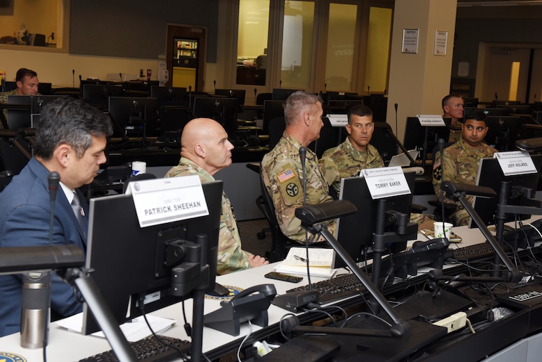 Maj. Gen. Robert F. Whittle Jr., (Second from right), U.S. Army Corps of Engineers Great Lakes and Ohio River Division commanding general, meets with partners at the Tennessee Emergency Management Agency in Nashville, Tenn., Oct. 2, 2019. TEMA Director Patrick Sheehan (Left), Maj. Gen. Tommy Baker (Second from Left), Tennessee deputy Adjutant General, Maj. Gen. Jeff Holmes (Third from Left), Tennessee Adjutant General, and Lt. Col. Sonny B. Avichal (Far Right), Nashville District commander, interacted with Whittle as he received info about the Tennessee National Guard and emergency operations in the state. (USACE photo by Lee Roberts)