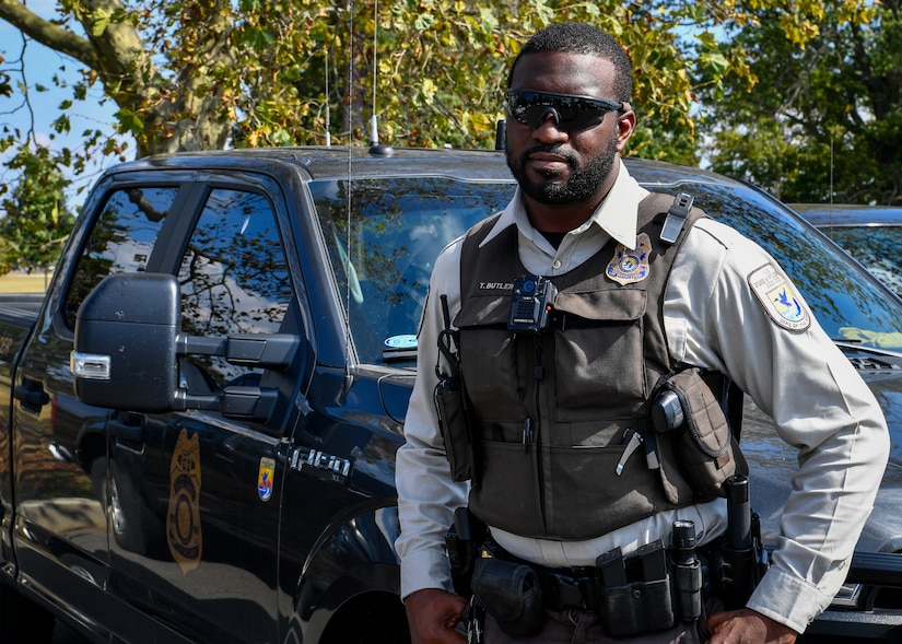 Terrance Butler, United States Fish & Wildlife Service federal Wildlife officer, poses in front of his work vehicle on Joint Base McGuire-Dix-Lakehurst, New Jersey, Oct. 2, 2019. Butler is the first USFWS officer assigned to Joint Base MDL where he will support the mission of the base in conjunction with assisting the conservation program that includes hunting, fishing and environmental issues.