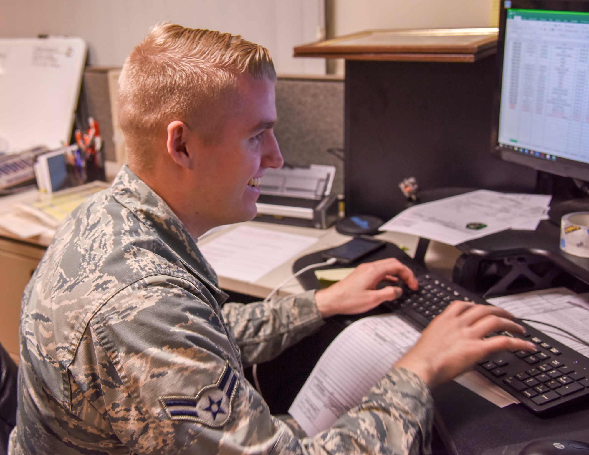 U.S. Air Force Airman 1st Class Carter Hellesto, 92nd Logistics Readiness Squadron fleet manager, purchases parts for vehicle maintenance