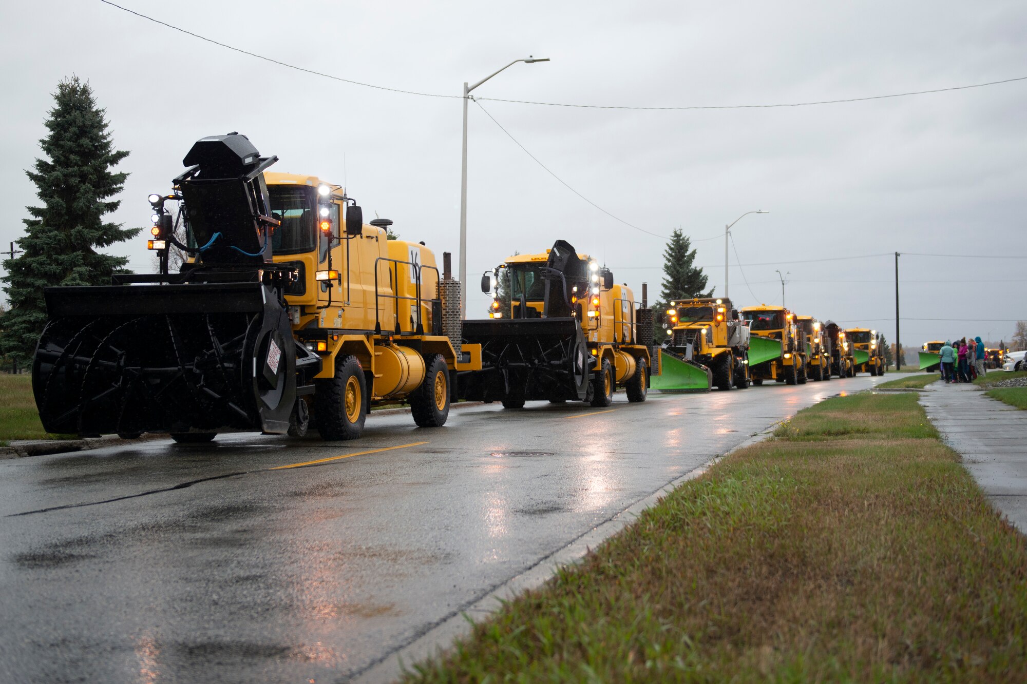 A member of the 773d Civil Engineering Squadron operates snow removal equipment during the annual Snow & Ice Parade on Joint Base Elmendorf-Richardson, Alaska, Oct. 4, 2019. The parade showcased the snow-removal vehicles snow barn personnel use to keep the airfield operational and the roads cleared.