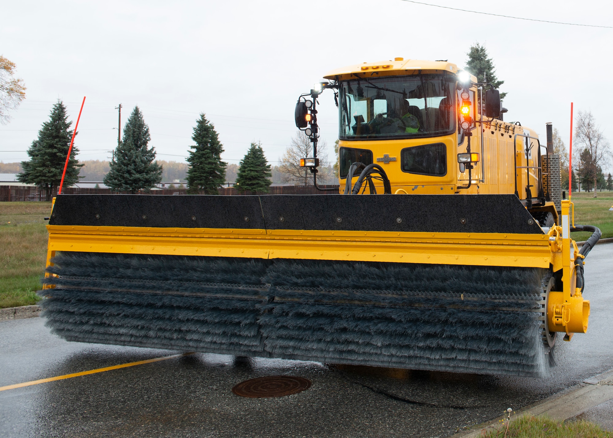 A member of the 773d Civil Engineering Squadron operates snow removal equipment during the annual Snow & Ice Parade on Joint Base Elmendorf-Richardson, Alaska, Oct. 4, 2019, the 773rd Civil Engineer Squadron’s annual Snow & Ice Parade at Joint Base Elmendorf-Richardson, Alaska, Oct. 4, 2019. The parade showcased the snow-removal vehicles snow barn personnel use to keep the airfield operational and the roads cleared.