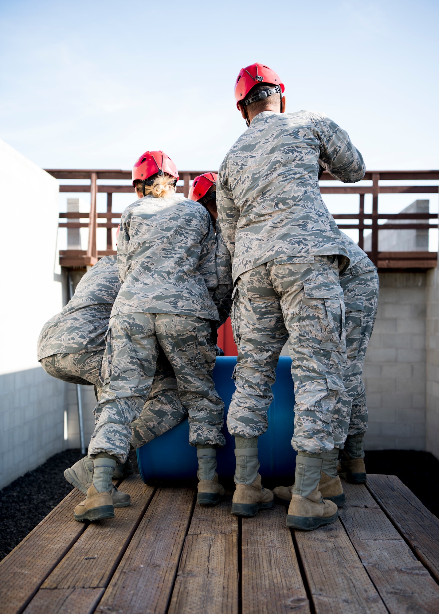 U.S. Air Force Airmen from the 366th Fighter Wing attempt to complete an obstacle September 30, 2019, at the Leadership Reaction Course (LRC) on Gowen Field, Idado. The LRC is used to develop leadership and followership skills through overcoming obstacles with limited resources while giving participants a chance to adapt and overcome through teamwork. (U.S. Air Force photo by Airman 1st Class Andrew Kobialka)