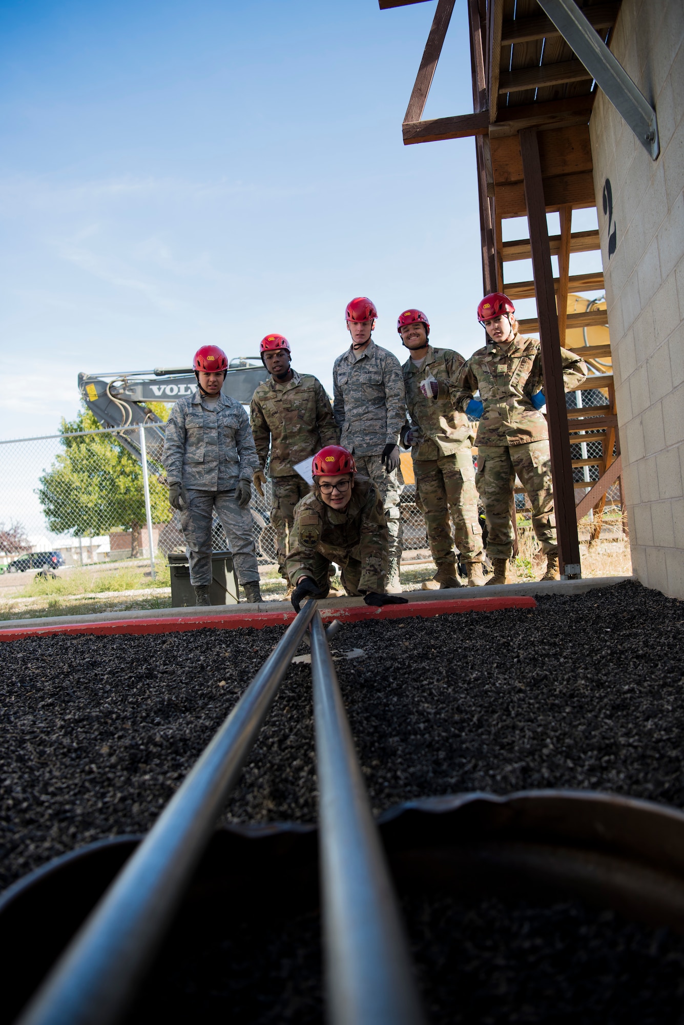 U.S. Air Force Airmen from the 366th Fighter Wing attempt to complete an obstacle September 30, 2019, at the Leadership Reaction Course (LRC) on Gowen Field, Idado. The LRC is used to develop leadership and followership skills through overcoming obstacles with limited resources while giving participants a chance to adapt and overcome through teamwork. (U.S. Air Force photo by Airman 1st Class Andrew Kobialka)