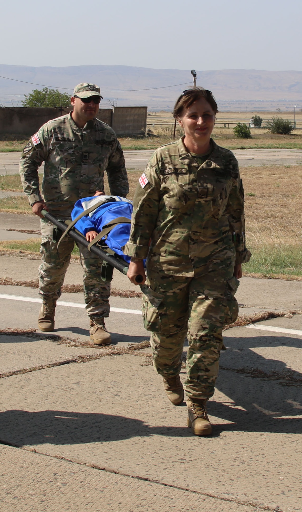 California Air National Guard members with the 146th Aeromedical Evacuation Squadron, California Air National Guard, partner with Georgian Defense Forces to provide all airlift support for Agile Spirit 19 in Tbilisi, Georgia. The exercise is designed to improve joint and multinational readiness, interoperability, mobility and posture of combat credible forces across the European theater specifically in Georgia. (U.S. Air National Guard photo by Tech. Sgt. Shaleata Johnson)