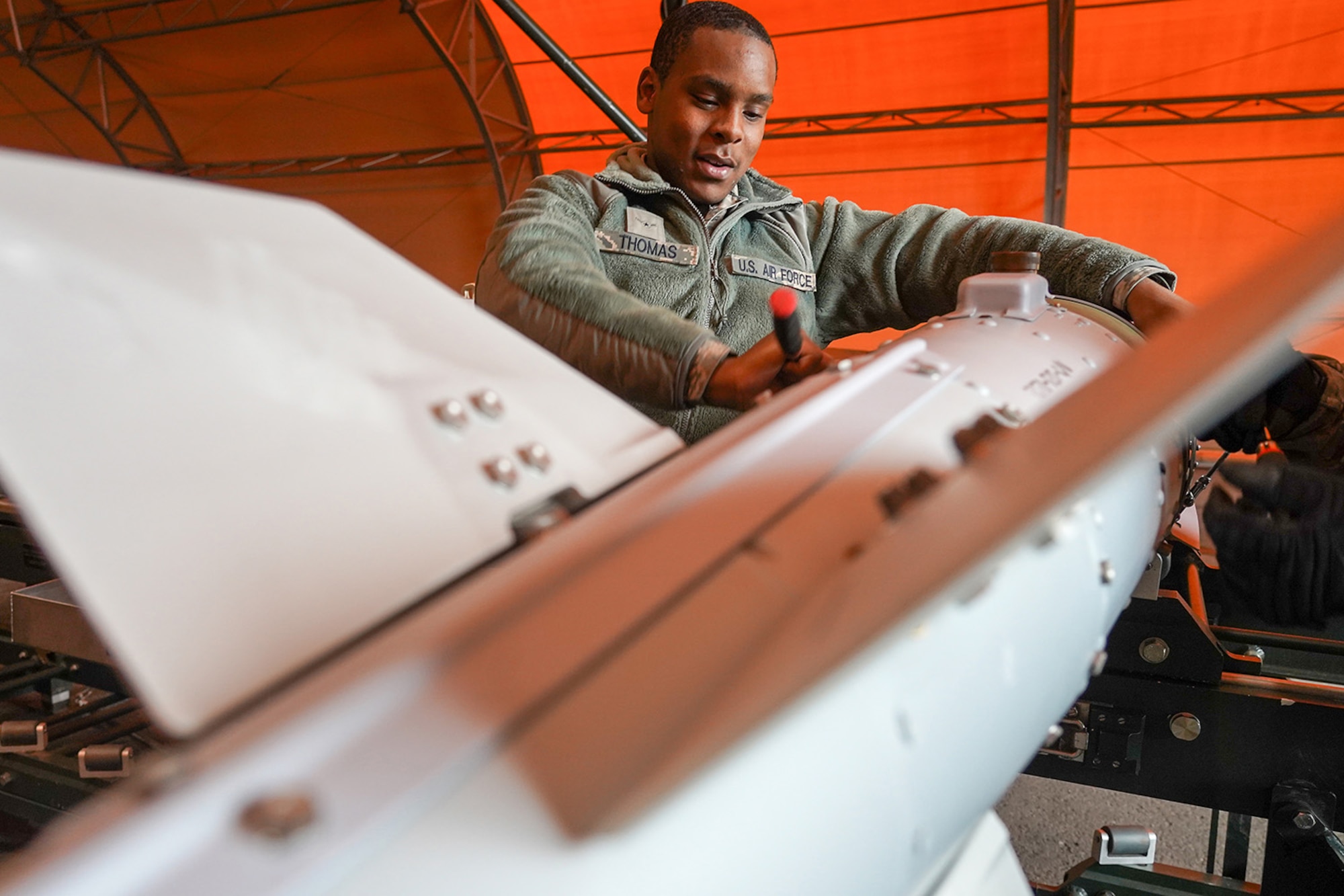 Airman Nathan Thomas, a native of Waco, Texas, assigned to the 3rd Munitions Squadron helps build a GBU-32 (Guided Bomb Unit) on Joint Base Elmendorf-Richardson, Alaska, Oct. 2, 2019, while participating in the Polar Force 20-1 exercise. Polar Force 20-1 is designed to exercise multiple elements of the Agile Combat Employment (ACE) concept of operations, which include generating 5th Generation combat power from austere locations, command and control using non-traditional methods, and rapid airlift capabilities to sustain a forward operating location.  The ACE concept enables 3rd Wing to deliver lethal Airpower for America, even in a contested environment.