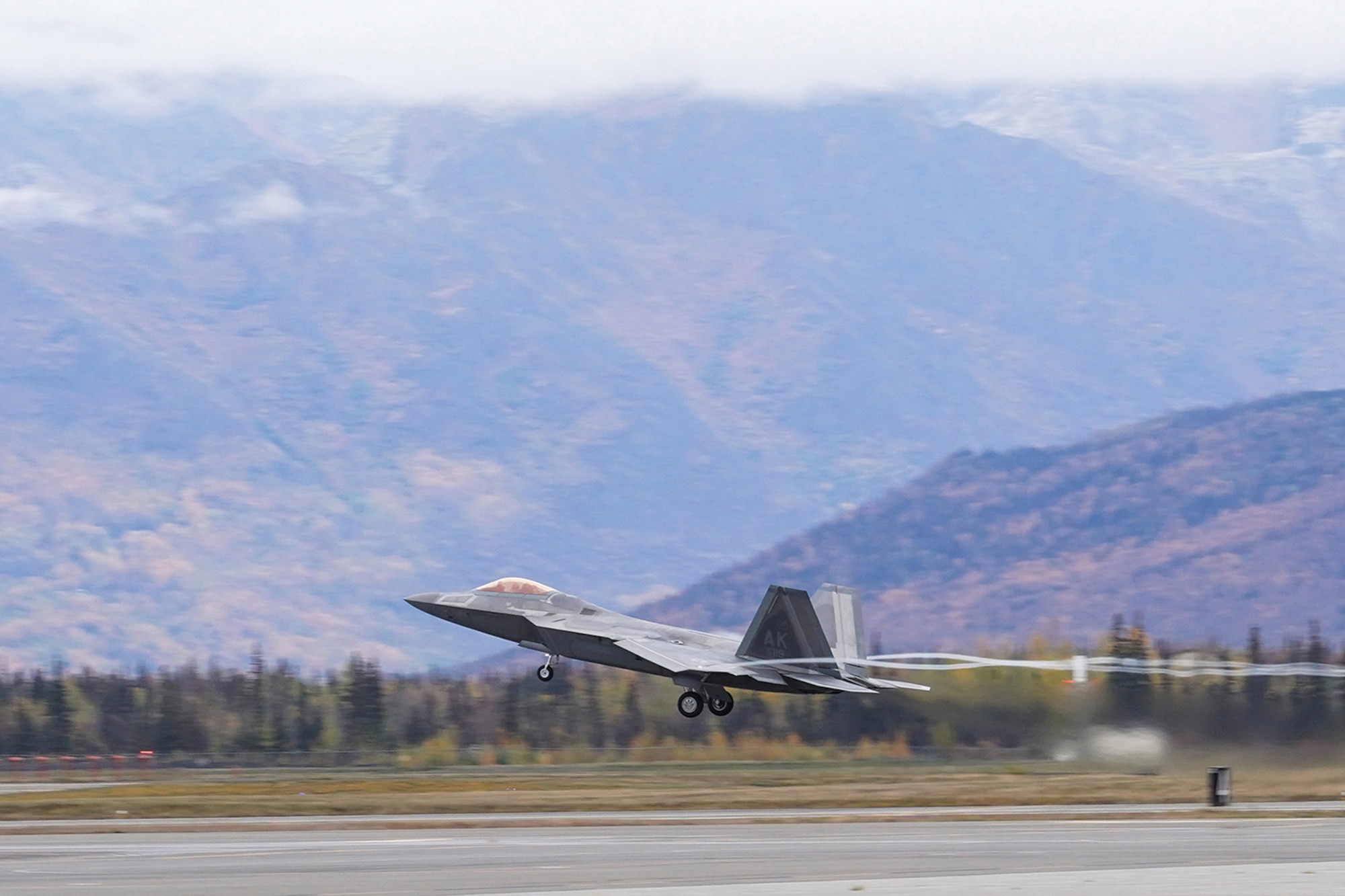 An F-22 Raptor of the 3rd Wing takes off from Joint Base Elmendorf-Richardson, Alaska, Oct. 2, 2019, while participating in the Polar Force 20-1 exercise. Polar Force 20-1 is designed to exercise multiple elements of the Agile Combat Employment (ACE) concept of operations, which include generating 5th Generation combat power from austere locations, command and control using non-traditional methods, and rapid airlift capabilities to sustain a forward operating location.  The ACE concept enables 3rd Wing to deliver lethal Airpower for America, even in a contested environment.