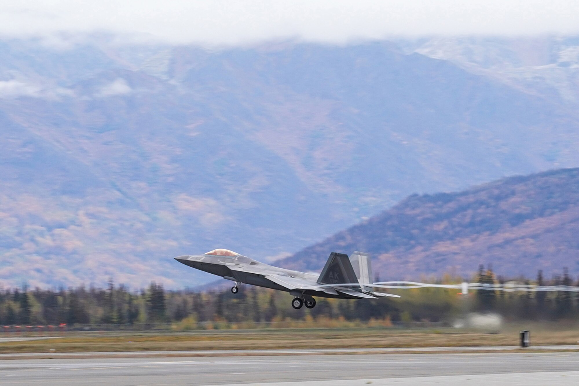 An F-22 Raptor of the 3rd Wing takes off from Joint Base Elmendorf-Richardson, Alaska, Oct. 2, 2019, while participating in the Polar Force 20-1 exercise. Polar Force 20-1 is designed to exercise multiple elements of the Agile Combat Employment (ACE) concept of operations, which include generating 5th Generation combat power from austere locations, command and control using non-traditional methods, and rapid airlift capabilities to sustain a forward operating location.  The ACE concept enables 3rd Wing to deliver lethal Airpower for America, even in a contested environment.