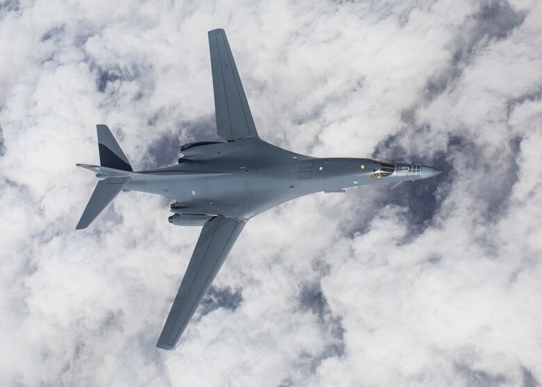 A B-1B Lancer descends after conducting air refueling