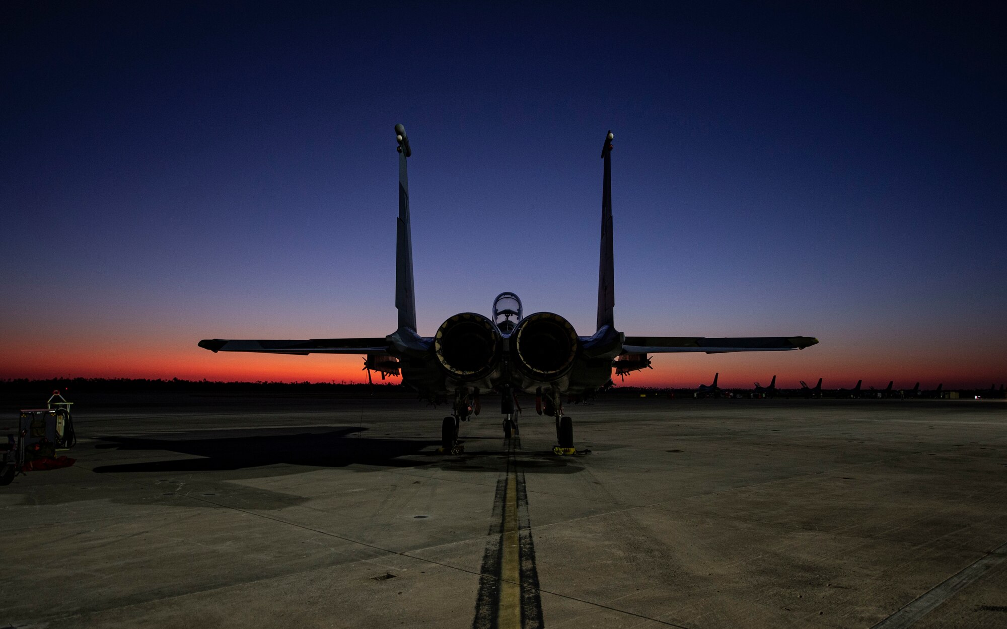 An F-15E Strike Eagle fighter jet assigned to the 422nd Test and Evaluation Squadron, Nellis Air Force Base, Nev., remains parked on the flightline during Combat Archer 19-12 at Tyndall AFB, Fla., Sept. 24, 2019. Combat Archer is part of the 53rd Wing’s Weapons System Evaluation Program. (U.S. Air Force photo by Airman 1st Class Bailee A. Darbasie)