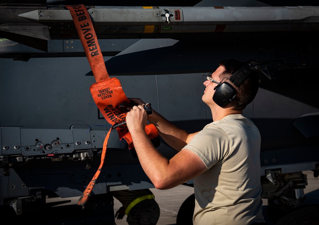 Staff Sgt. Troy Everson, an aircraft armament systems technician assigned to the 757th Aircraft Maintenance Squadron, prepares an F-15E Strike Eagle fighter jet for takeoff during Combat Archer 19-12 at Tyndall Air Force Base, Fla., Sept. 24, 2019. A new software on the F-15E aircraft was evaluated during this iteration of Combat Archer. (U.S. Air Force photo by Airman 1st Class Bailee A. Darbasie)