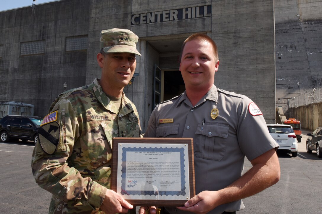 Maj. Gen. Robert F. Whittle Jr., USACE Great Lakes and Ohio River Division commanding general; presents the division’s Natural Resources Management Employee of the Year Award for 2018 to Park Ranger John Malone at Center Hill Dam in Lancaster, Tenn., Oct. 2, 2019. (USACE photo by Lee Roberts)