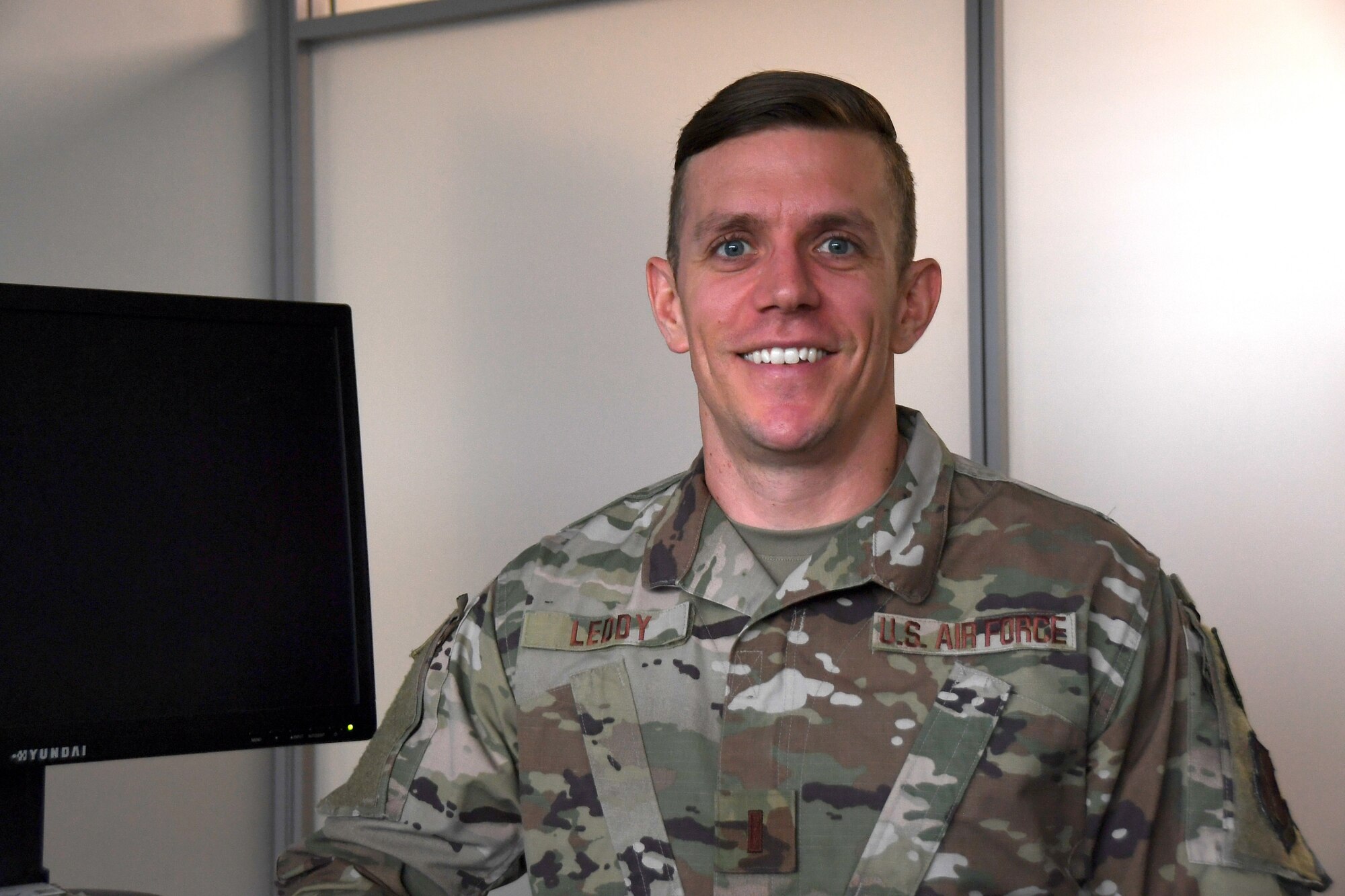 U.S. Air Force 2nd Lt. Zachary Leddy, 145th Airlift Wing Contracting officer, posed for a picture at his desk after discussing his involvement in the year end fiscal purchases with unexpected funding at the North Carolina Air National Guard (NCANG) Base, Charlotte Douglas International Airport, Oct. 4th, 2019. Members from the 145th Airlift Wing Contracting office, Finance, and Logistics Readiness Squadron collaborated across the wing to ensure end of year funds were appropriately spent on equipment needed for readiness for the 118th ASOS and 145th Airlift Wing. Members were able to purchase equipment for almost 1,500 members of the NCANG to ensure deployment readiness.