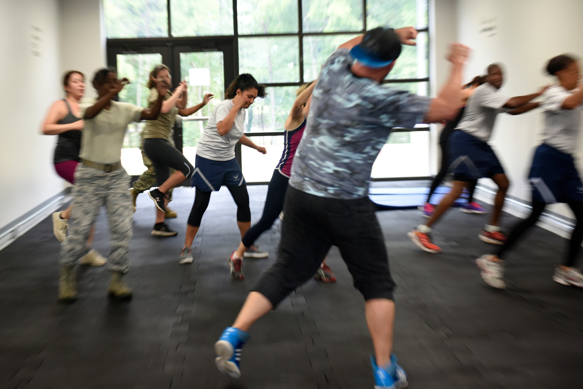 Members of the North Carolina Air National Guard participate in a National Hispanic Month inspired bootcamp Zumba class instructed by Will Fields, cousin of U.S. Air Force 1st. Sgt. Jorge Bedoya, 145th Medical Group, Oct. 5th, 2019. More than twenty people came out to the class as a means to appreciate another culture, and to enjoy the Hispanic music and exercise.