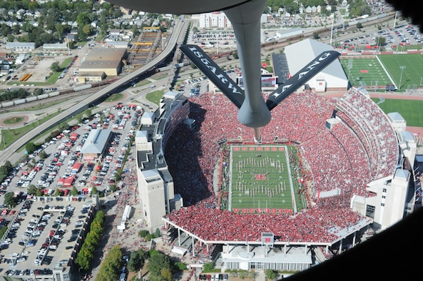 The boom of a KC-135 Stratotanker with the Iowa National Guard's 185th Air Refueling Wing is lowered as the aircraft flies over Memorial Stadium in Lincoln, Neb. before the kickoff of the Nebraska verses Northwestern game of Oct. 5.