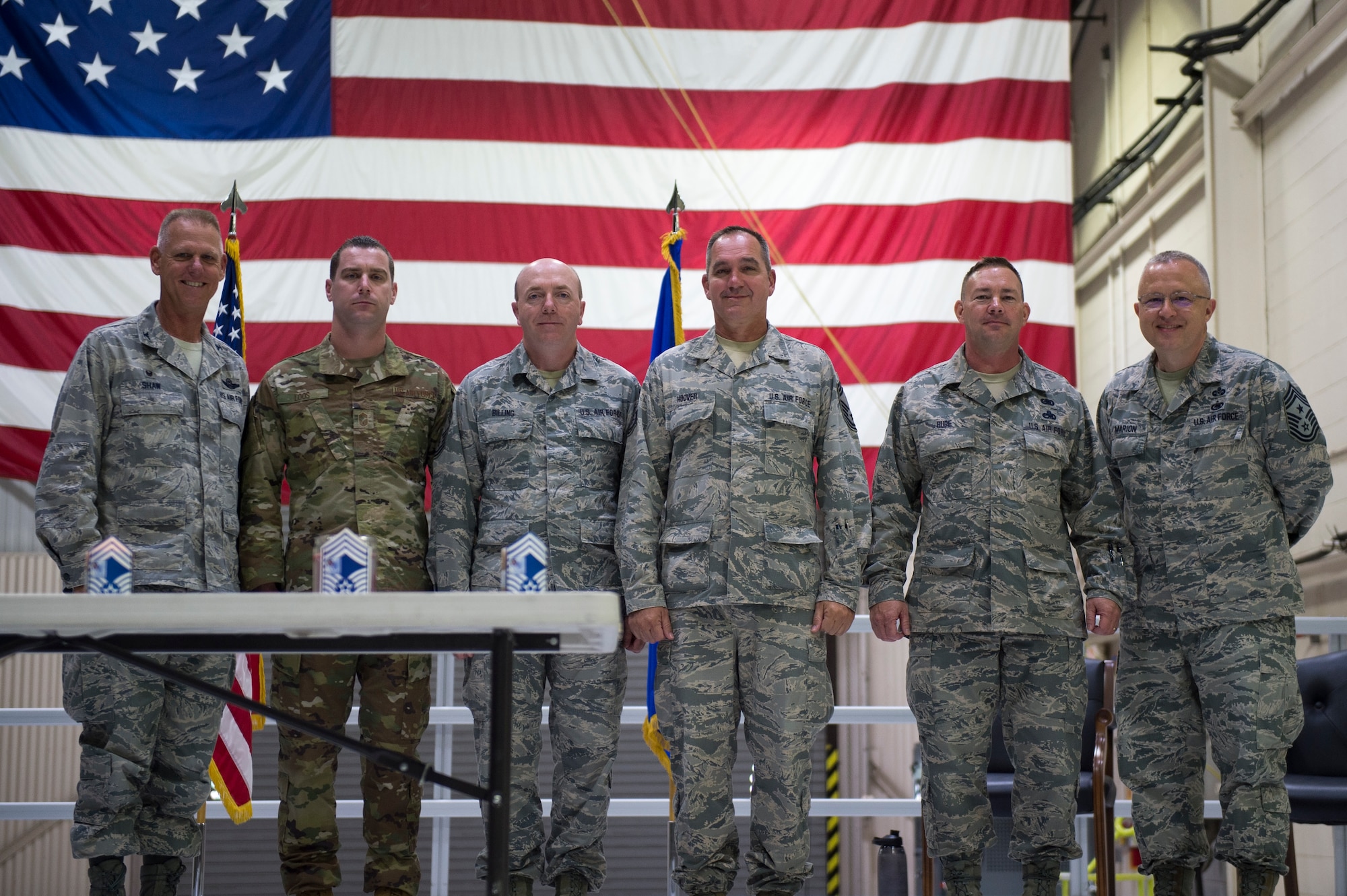 Col. Larry Shaw, 434th Air Refueling Wing commander left and Chief Master Sgt. Wes Marion, 434th Air Refueling Squadron command chief right pose with new chief master sergeants during an induction ceremony here Oct. 6, 2019. Chief Master Sgt. Adam Loos, 434th Civil Engineer Squadron, Chief Master Sgt. James Billing, 434th Maintenance Squadron, Chief Master Sgt. Charles Hoover, 434th Maintenance Group and Chief Master Sgt. Brian Rude, 434th Logistics Readiness Squadron. The new chiefs were among the 73 Airmen who were inducted into the ranks of noncommissioned officers and senior noncommissioned officers. (U.S. Air Force Photo/Tech. Sgt. Jami K. Lancette)