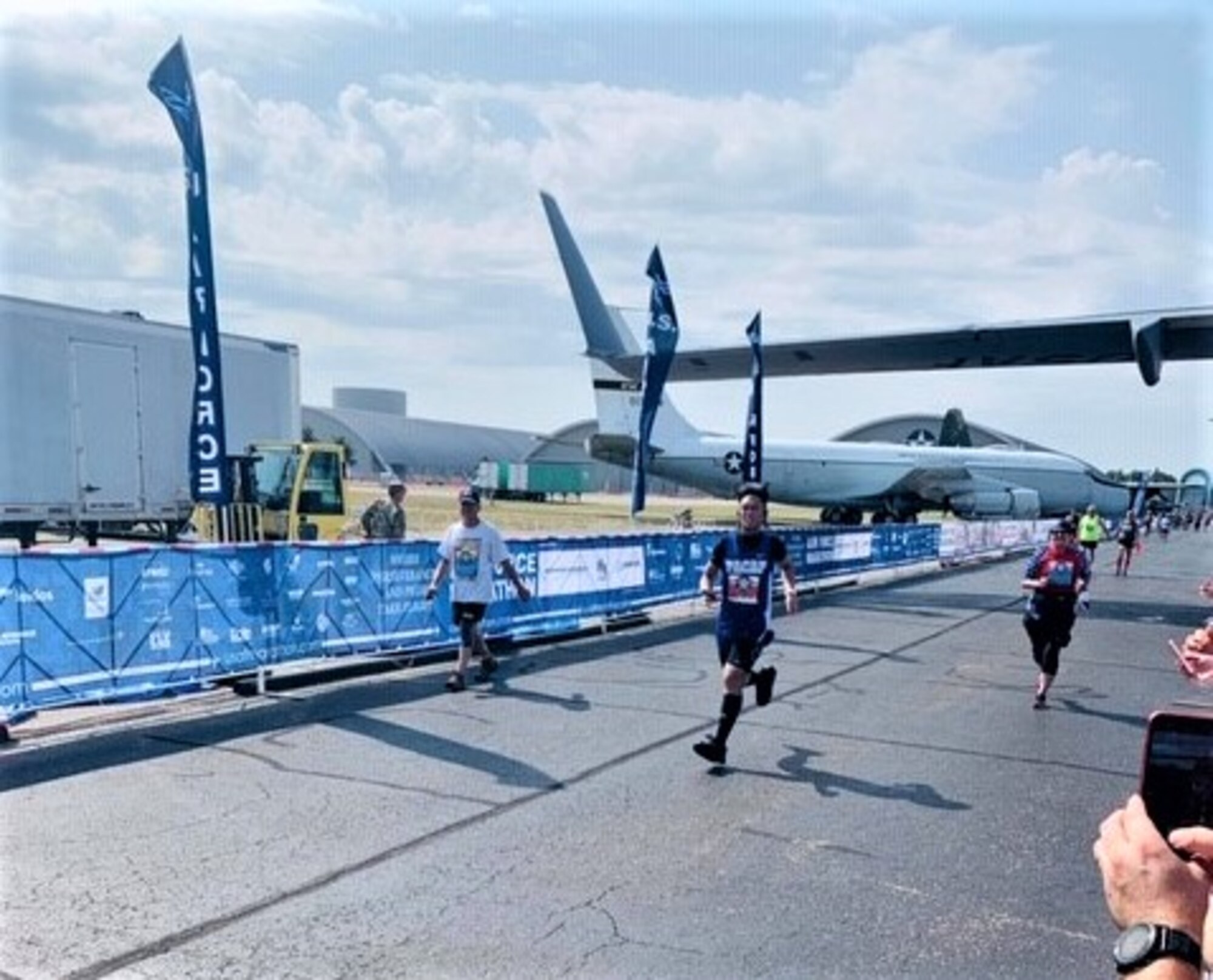 U.S. Air Force Staff Sgt. Daniel Ly, 8th Force Support Squadron customer support noncommissioned officer in charge, run during the Air Force Marathon at Wright-Patterson Air Force Base, Ohio, Sept. 21, 2019. Ly ran on behalf of the U.S. Pacific Air Forces team and was only one of four selected to run the full marathon. (Courtesy photo)