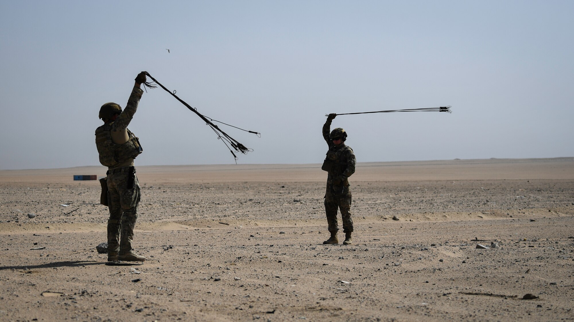 Airmen assigned to the 386th Expeditionary Civil Engineer Squadron explosive ordnance disposal flight at Ali Al Salem Air Base, swing spin igniter, fuse and blasting cap assemblies before a rapid airfield damage repair exercise at Udari Range, Kuwait, Sept. 25, 2019. The assemblies are spun to remove coils and straighten the fuses to easily attach to high explosives.