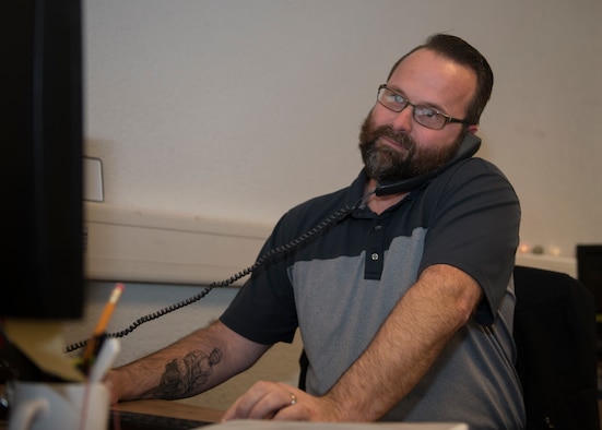 Anthony Brown, WSA unit program manager, works at his computer at Ramstein Air Base, Germany, October 3, 2019. The Airlifter of the Week program recognizes outstanding personnel who go above and beyond their normal duties of work.