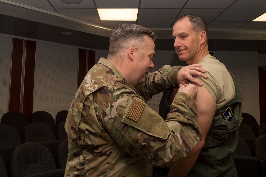 U.S. Air Force Col. Matt Husemann, 86th Airlift Wing vice commander, receives his flu vaccine in the wing conference room at Ramstein Air Base, Germany, Oct. 7, 2019. The yearly flu vaccine is mandatory for all military members to prevent illness during the flu season. The 86th Medical Group is scheduled to distribute vaccines to walk-ins, Oct. 16, at the Southside Fitness Center from 7 a.m. to 8 p.m. (U.S. Air Force photo by Staff Sgt. Jonathan Bass)