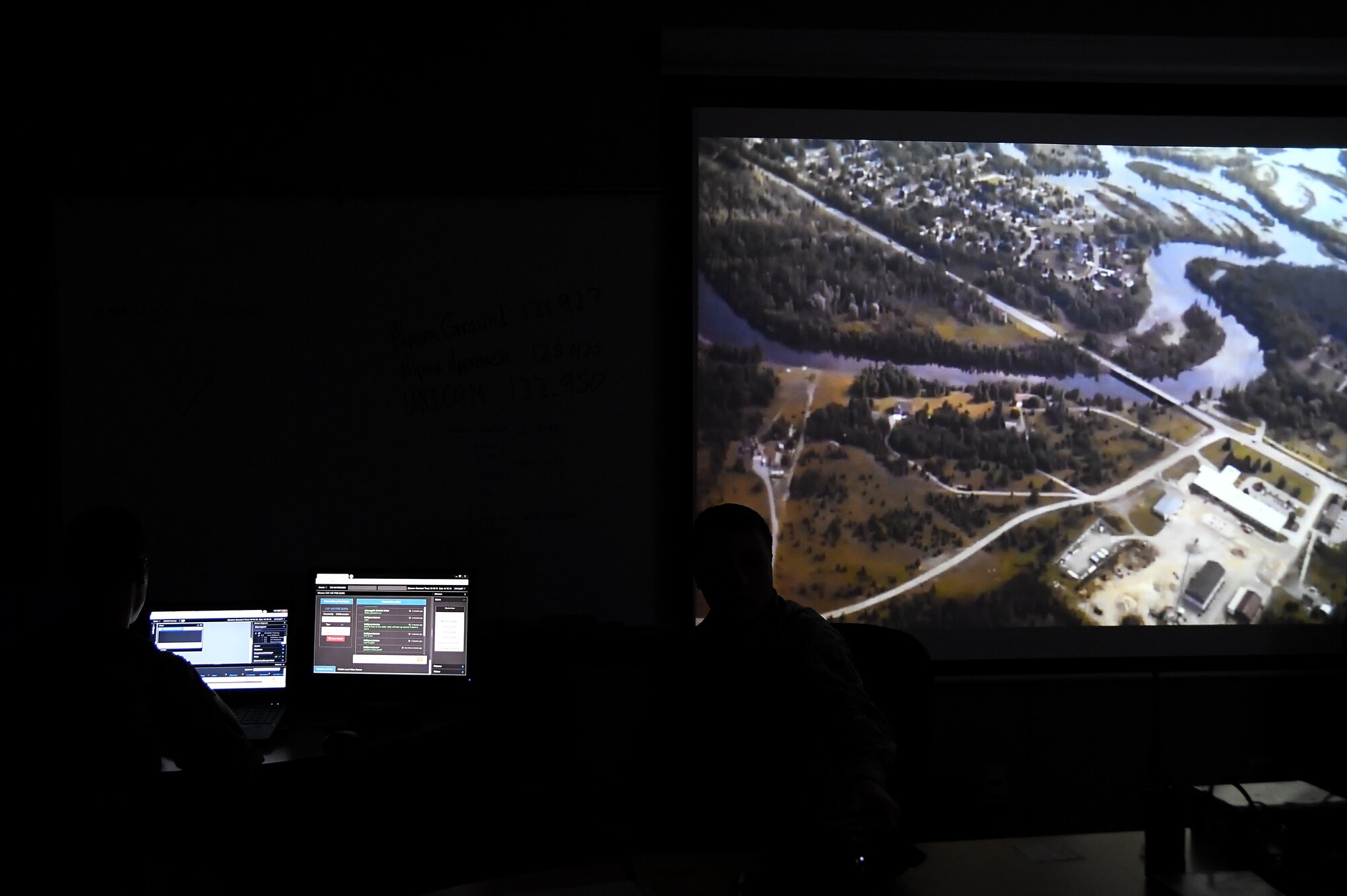 U.S. Air Force Airmen, assigned to the Incident Awareness and Assessment team at the 178th Wing, Ohio Air National Guard, analyze imagery Aug. 13, 2019, at Alpena Combat Readiness Training Center in Alpena, Michigan. Members worked with Civil Air Patrol to provide imagery analysis of training exercises being conducted by other 178th Wing personnel on the ground at the Alpena CRTC. (U.S. Air National Guard photo by Senior Airman Amber Mullen)