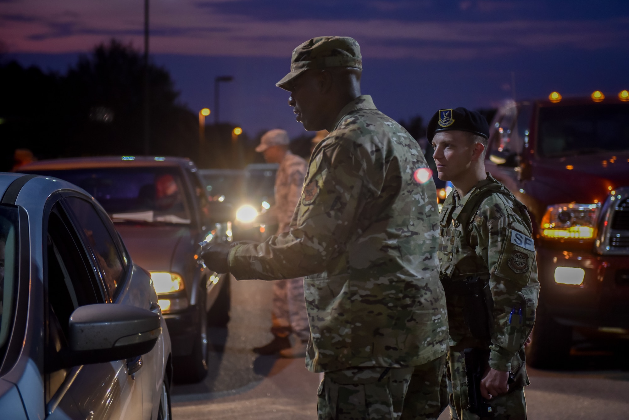 Chief Wright check IDs at the gate before sun rise