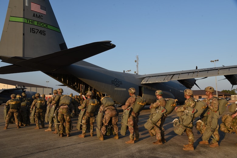 Soldiers of the 4th Brigade Combat Team (Airborne), 25th Infantry Division stationed at Joint Base Elmendorf-Richardson, Alaska board a C-130J flown by the 327th Airlift Squadron during a joint forces training exercise called Arctic Anvil, Oct. 1-6, at Gulfport Combat Readiness Training Center, Miss. Reserve Citizen Airmen from the 815th AS assigned to the 403rd Wing at Keesler Air Force Base, Miss., and the 327th AS assigned to the 913th Airlift Group at Little Rock AFB, Ark., provided airlift and airdrop capabilities during the exercise. (U.S. Air Force photo by Jessica L. Kendziorek)