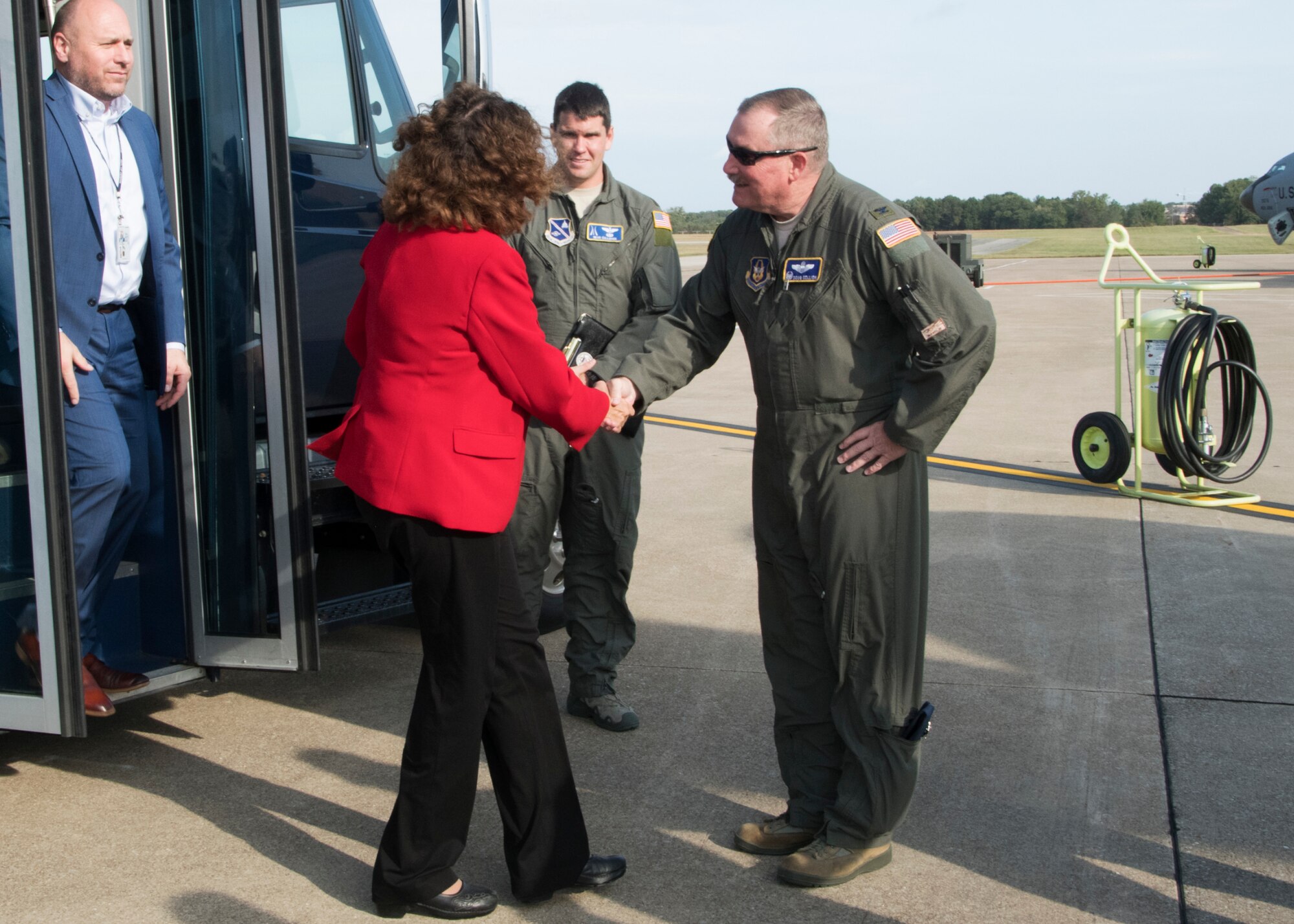 Col. Douglas Gullion, 459th Air Refueling Wing Commander, greets Ms. Michelle Lowesolis, Director, Defense Civilian Personnel Advisory Service, during a visit, Oct. 7, 2019, on Joint Base Andrews, Md. Lowesolis along with 18 members were briefed on the KC-135 Stratotanker and given a tour of the aircraft. (U.S. Air Force photo by Staff Sgt. Cierra Presentado/Released)