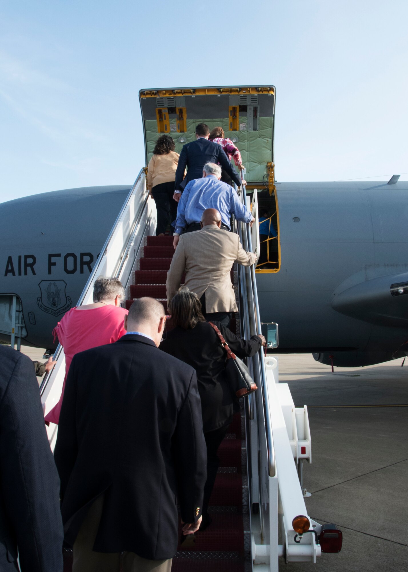 Members of Headquarters Air Force enter a KC-135 Stratotanker during a tour, Oct. 7, 2019 on Joint Base Andrews, Md. The team was briefed on the KC-135 and given a tour of the aircraft. (U.S. Air Force photo by Staff Sgt. Cierra Presentado/Released)