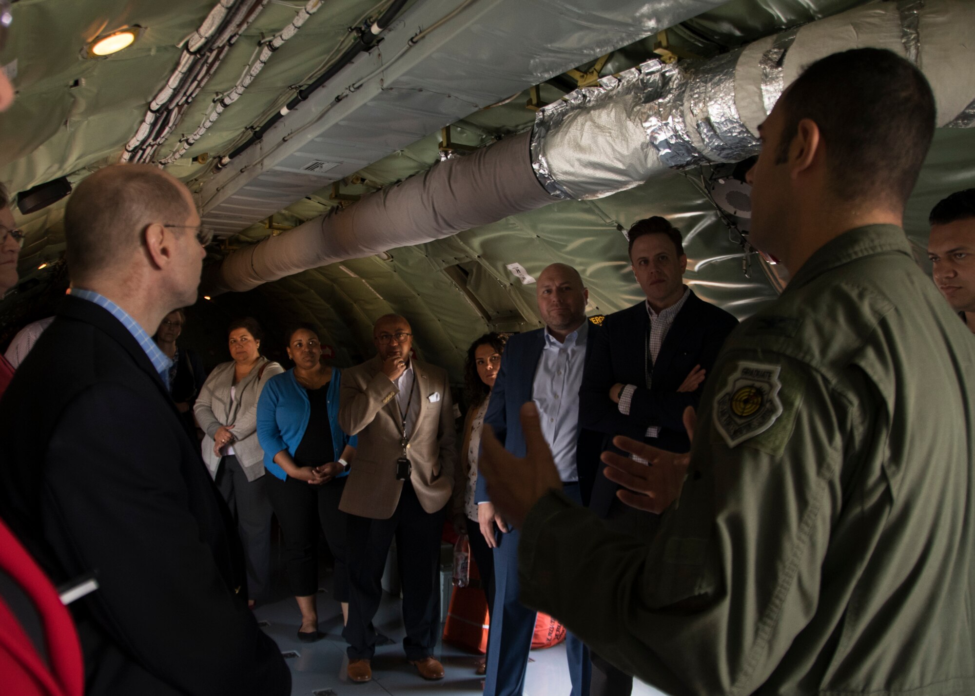 Col. Daniel Menashi, 459th Operations Group Commander, briefs members of Headquarters Air Force on the KC-135 Stratotanker during a visit, Oct. 7, 2019 on Joint Base Andrews, Md. The team was briefed on the KC-135 and given a tour of the aircraft. (U.S. Air Force photo by Staff Sgt. Cierra Presentado/Released)
