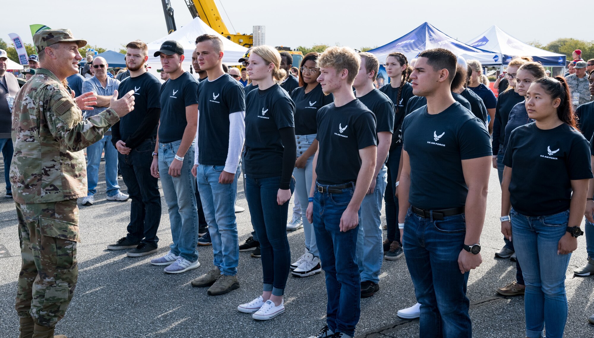 Maj. Gen. Clinton Crosier, assigned to the Deputy Chief of Staff for Strategy, Integration and Requirements, Headquarters U.S. Air Force, Arlington, Va., speaks to 26 U.S. Air Force recruits entering the Delayed Entry Program Oct. 6, 2019, at Dover International Speedway, Dover, Del. Active-duty recruits join the U.S. Air Force through the DEP: an enlistment into the inactive Reserves, with an agreement to report for active duty to attend basic military training at a specified time in the future. (U.S. Air Force photo by Roland Balik)