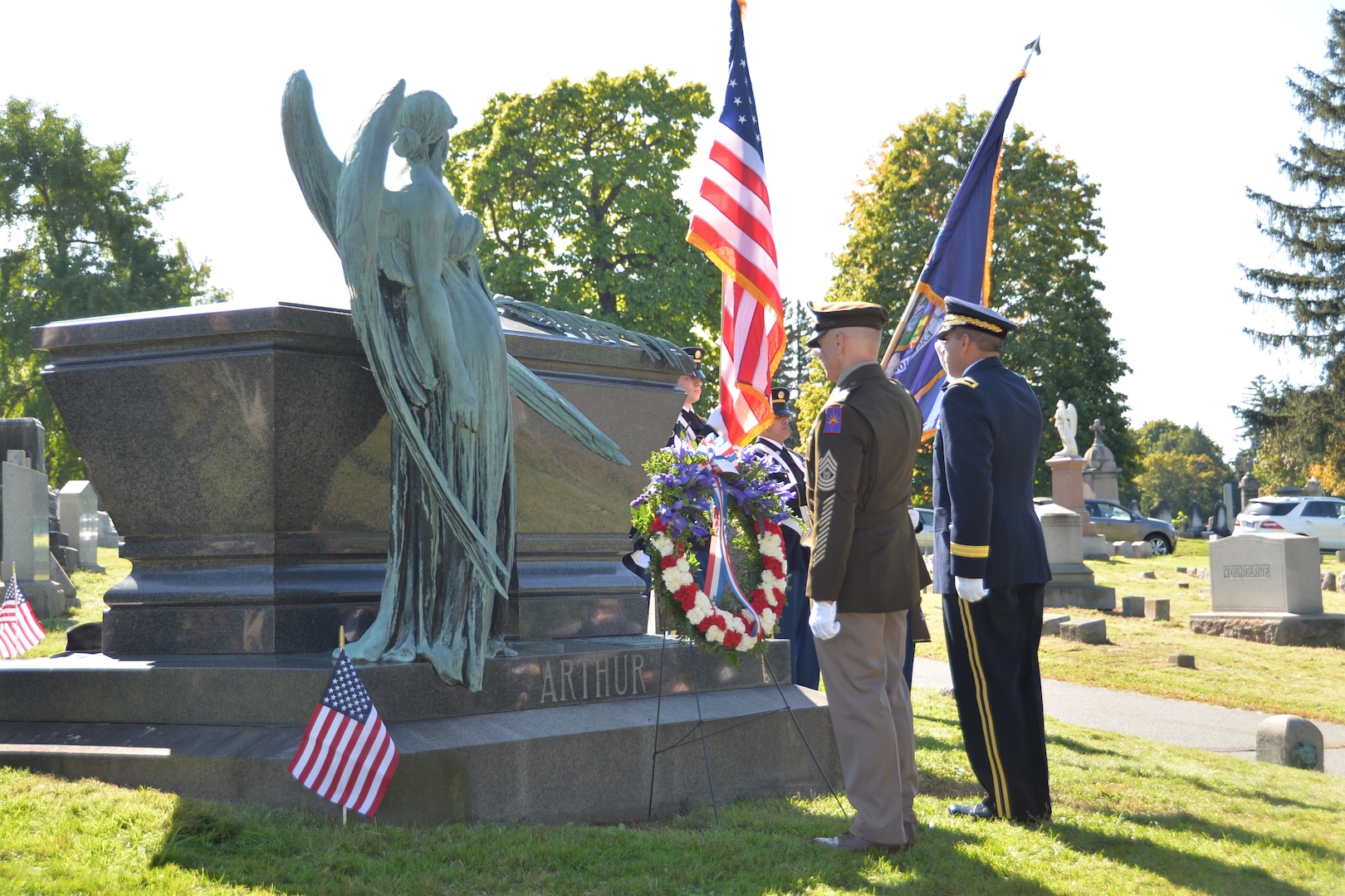 Brig. Gen. John Andonie, the New York National Guard director of joint staff, and New York Command Sgt. Major David Piwowarski present arms while taps is played after laying a wreath at the grave of President Chester Arthur at Albany Rural Cemetery in Menands, N.Y. Oct. 5, 2019. The military honors past presidents by laying a wreath from the current president on their graves on their birthday. The New York National Guard honors Arthur, who served from 1881 to 1885, and Presidents Martin Van Buren and Millard Fillmore.