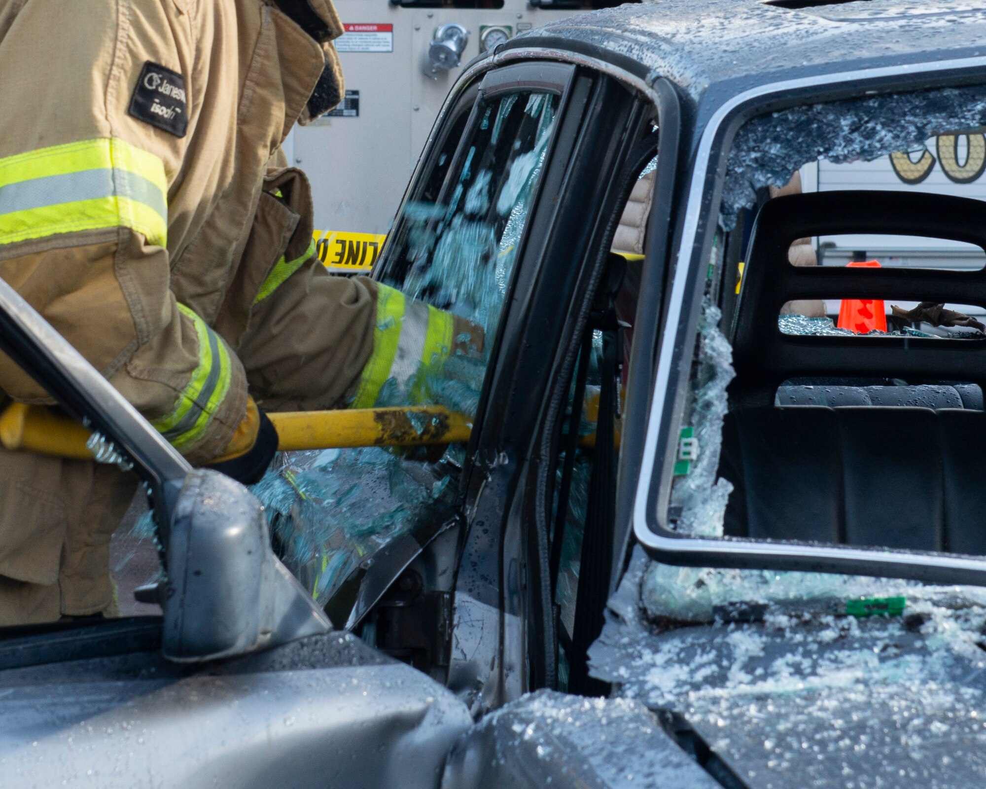 A firefighter with the 673d Civil Engineer Squadron Fire and Emergency Services demonstrates breaking open a vehicle window in an emergency during a Joint Base Elmendorf-Richardson Fire and Emergency Services open house at Fire Station 3 on JBER, Alaska, Oct. 5, 2019. The open house kicked off this year’s Fire Prevention Week, a week to promote preparation for emergencies.