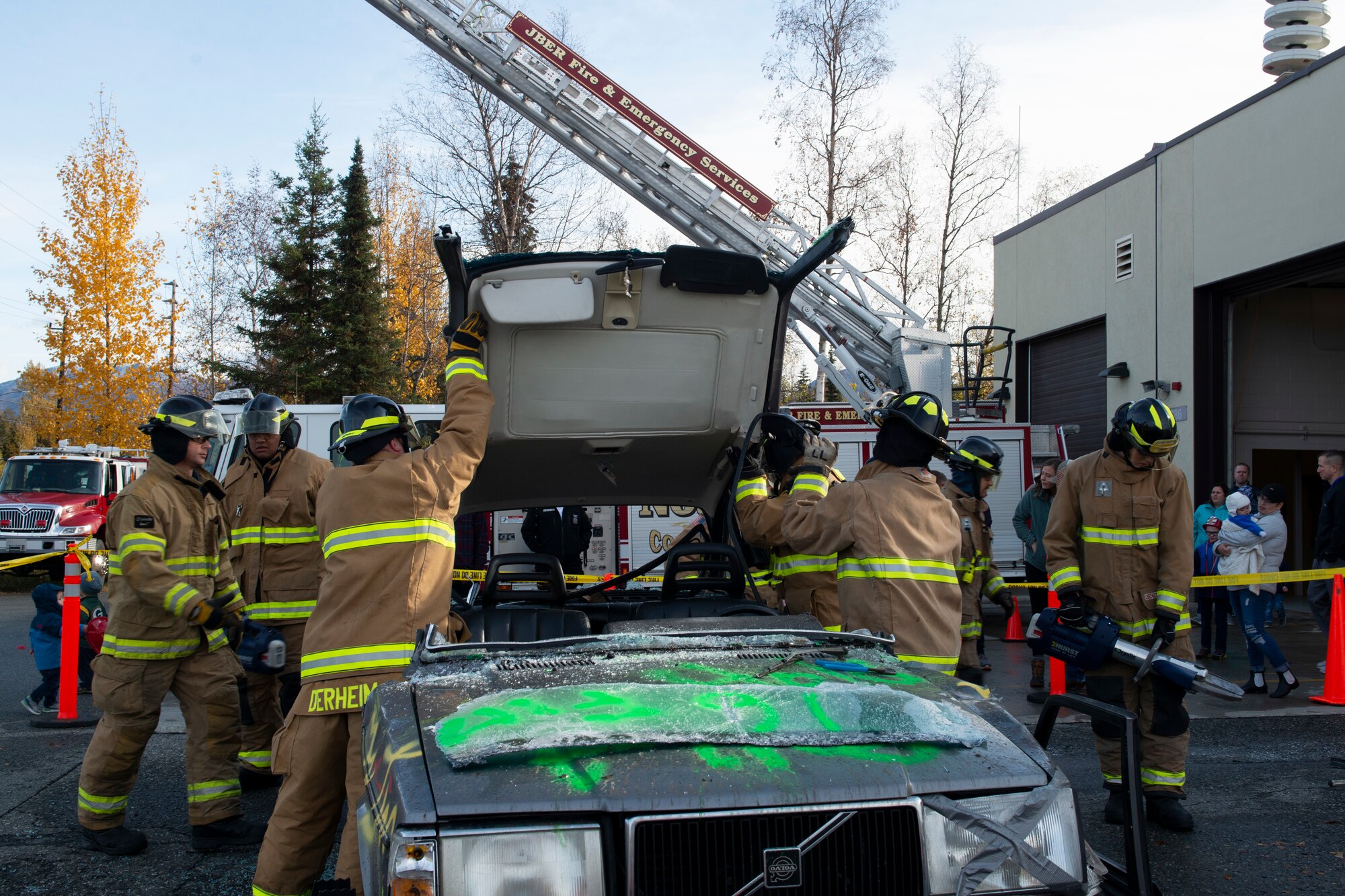 Firefighters with 673d Civil Engineer Squadron Fire and Emergency Services roll back the roof of a car during a Joint Base Elmendorf-Richardson Fire and Emergency Services open house at Fire Station 3 on JBER, Alaska, Oct. 5, 2019. The open house kicked off this year’s Fire Prevention Week, a week to promote preparation for emergencies.