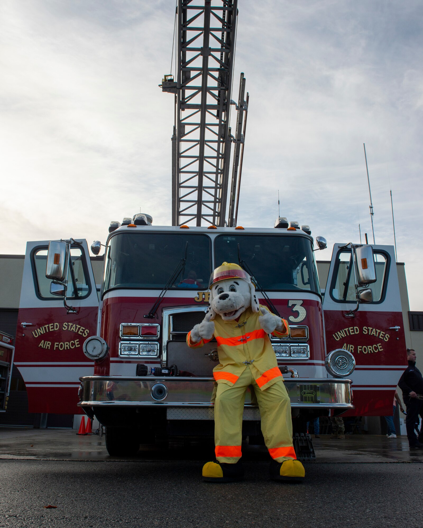 Sparky, the National Fire Protection Association mascot, poses for a photo during a Joint Base Elmendorf-Richardson Fire and Emergency Services open house at Fire Station 3 on JBER, Alaska, Oct. 5, 2019. The open house kicked off this year’s Fire Prevention Week, a week to promote preparation for emergencies.