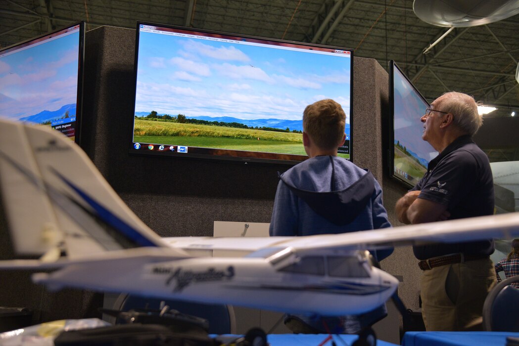 A student using a flight simulator.