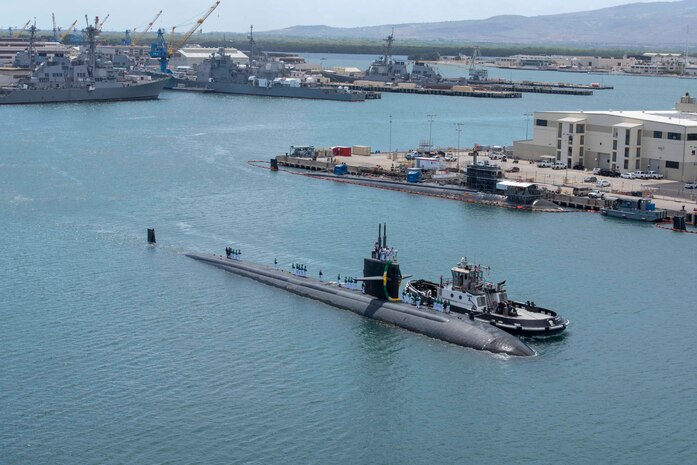 190908-N-UD469-0004 JOINT BASE PEARL HARBOR-HICKAM Sept. 8, 2019 -- The Los Angeles-class fast-attack submarine USS Olympia (SSN 717) returns home following a seven-month deployment. Olympia conducted an around-the-world deployment in support of maritime security operations with allies and partners to ensure high-end war fighting capabilities in this era of great power competition. (U.S. Navy photo by Mass Communication Specialist 1st Class Amanda Gray/Released)