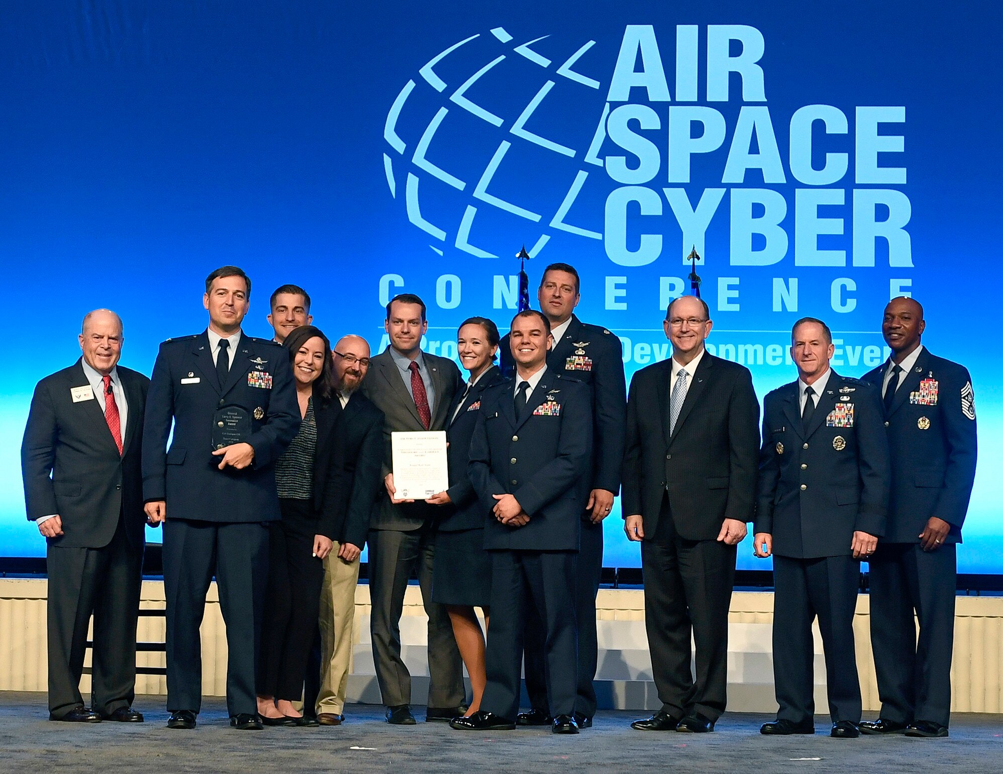 The Kessel Run Team receives the Gen. Larry O. Spencer Innovation Award from Air Force Chief of Staff Gen. David L. Goldfein, Acting Secretary of the Air Force Matthew Donovan, Chief Master Sgt. of the Air Force Kaleth Wright and Whit Peters, Chairman of the Air Force Association Board, during the Air Force Association Air, Space and Cyber Conference in National Harbor, Md., Sept. 16, 2019.(U.S. Air Force photo by Andy Morataya)