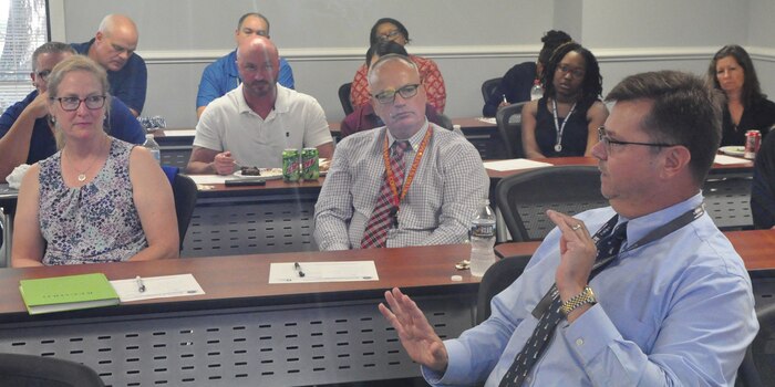 IMAGE: DAHLGREN, Va. (Oct. 4, 2019) – Chuck Campbell – Naval Surface Warfare Center Dahlgren Division (NSWCDD) chief of staff – shares his perspective on career opportunities for employees in the Navy’s non-technical civilian career path with more than 30 of his fellow veterans at the command’s Veterans Integration event. The NSWCDD Employee Engagement Program, which includes the Veteran Integration Initiative, sponsored the event to facilitate new opportunities for connection and networking among NSWCDD veterans.