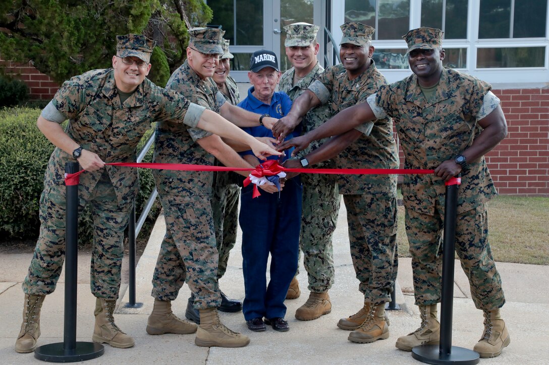 Marine Corps Logistics Commanding General, Maj. Gen. Joseph Shrader, Marine Corps Logistics Base Albany Commanding Officer Col. Alphonso Trimble, Naval Clinic Commander Jeremy Pyles and Sergeant Majors Jeffrey Young and Michael Rowan attended the ribbon cutting ceremony for the Clubs of Dubber's Oak, October 3. The Officer and SNCO Clubs are now co-located in the Town & Country Complex. (U.S. Marine Corps photo by Re-Essa Buckels)
