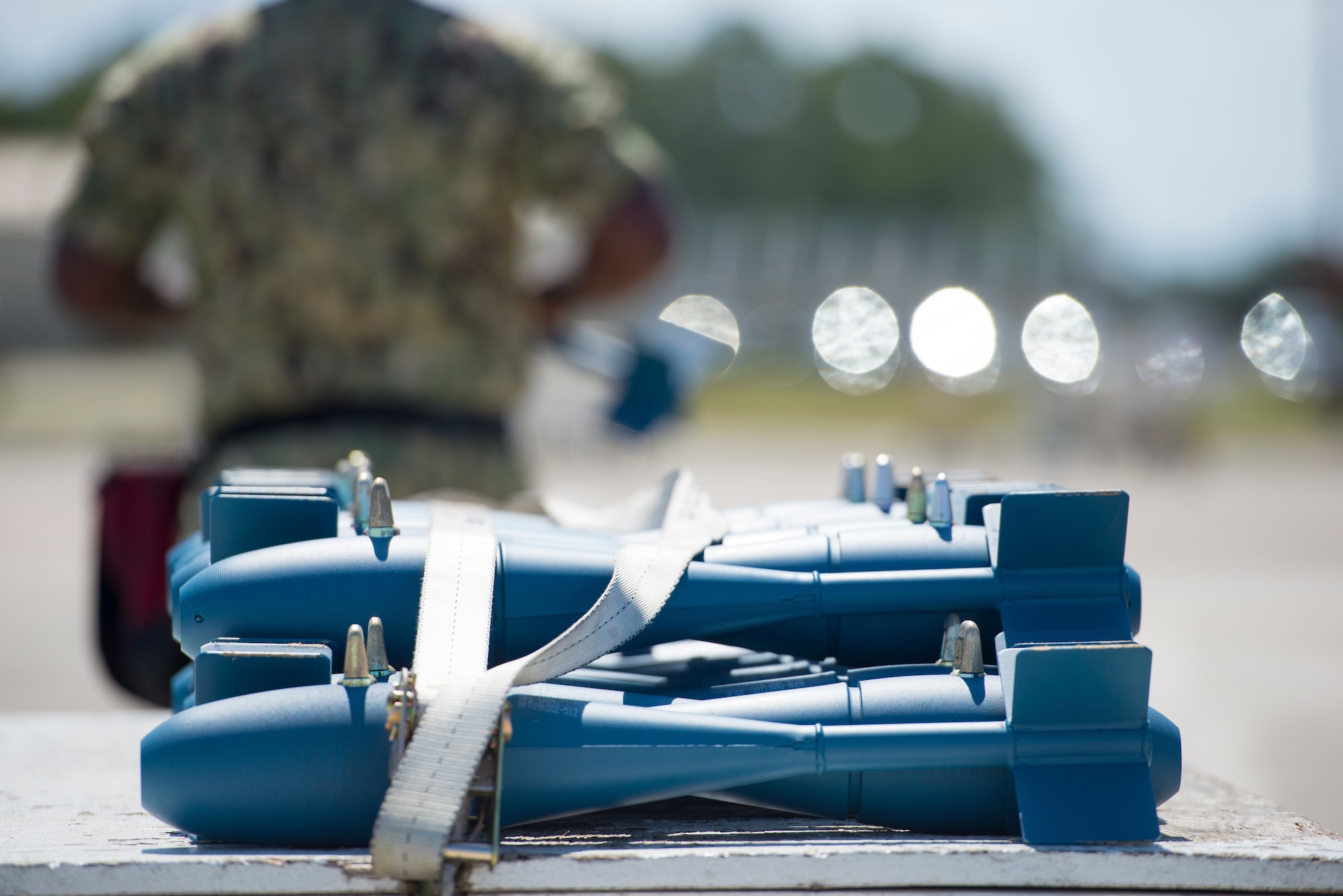 U.S. Navy Sailors with the Strike Fighter Squadron 106 from Naval Air Station Oceania, Va., secure Mk-76 practice bombs before a training exercise at MacDill Air Force Base, Fla., Oct. 1, 2019.