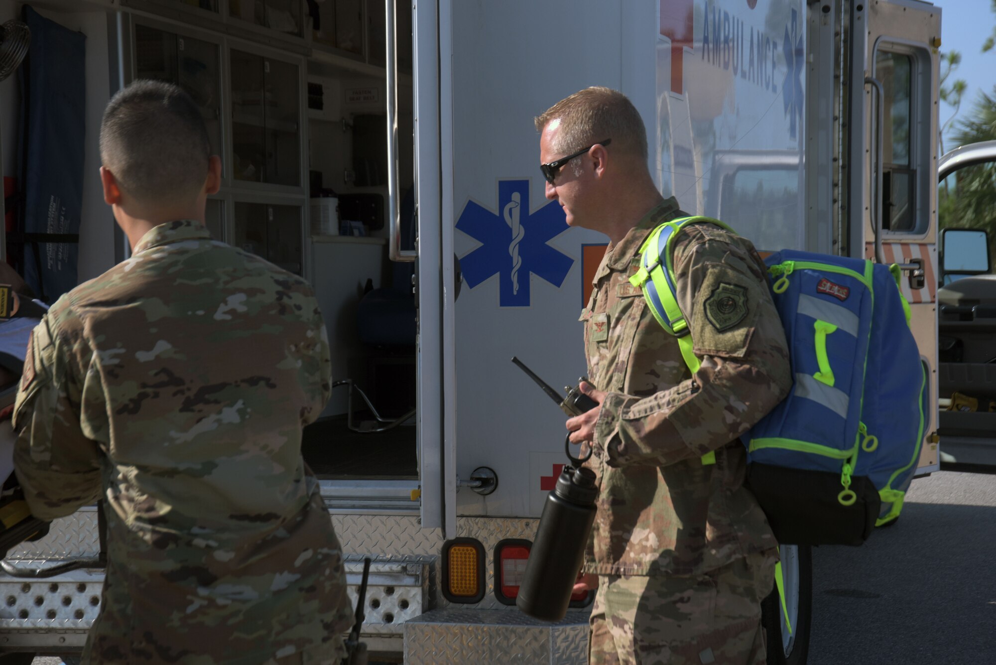 Col. Brian Laidlaw, 325th Fighter Wing commander, carries an emergency medical response go-bag during an exercise Oct. 4, 2019, at Tyndall Air Force Base, Florida. The 325th Operational Medical Readiness Squadron Ambulance Services Department medics were chosen to represent the 325th Medical Group for the commander’s Airman Shadow Program, which aims to give the commander a first-hand view of what Airmen do on the job. (U.S. Air Force photo by Staff Sgt. Magen M. Reeves)