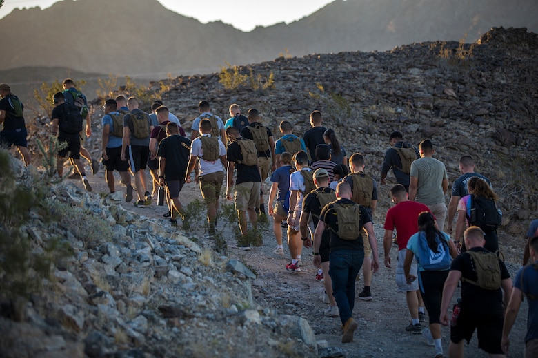 U.S. Marines with Headquarters and Headquarters Squadron (H&HS), Marine Corps Air Staiton Yuma participate in a hike up Telegraph Pass as a part of Operation Future Marine Leaders (FML) in Yuma, Ariz., Oct 4, 2019. FML consisted of the Commanding Officer and SgtMaj of H&HS hiking with the junior Marines up Telegraph Pass, conducting a professional military education (PME), and speaking to the junior Marines about becoming leaders. (U.S. Marine Corps photo by Lance Cpl. John Hall)