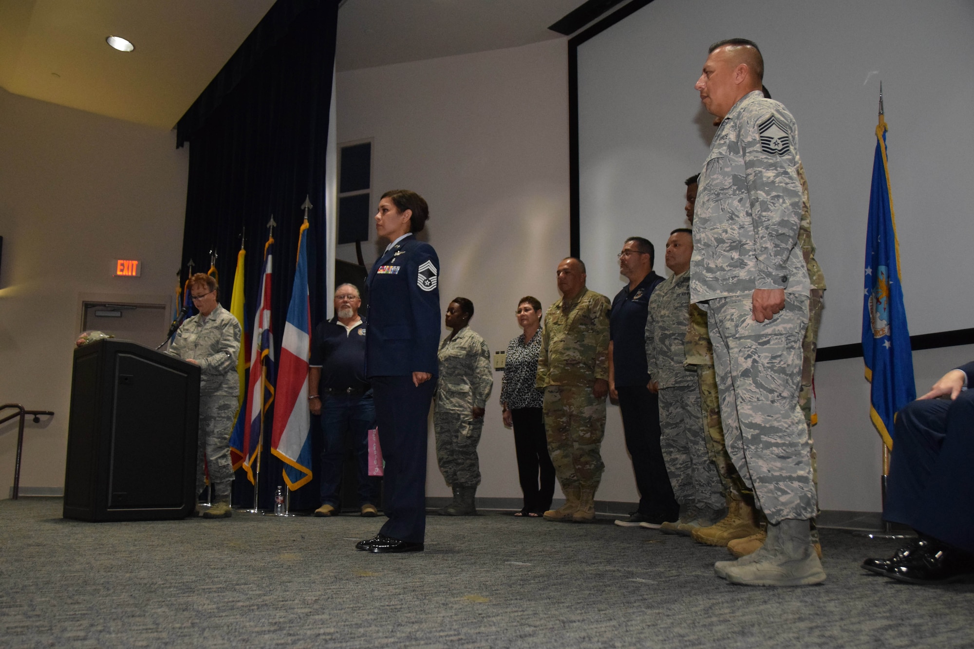 Chief Master Sgt. Shana Cullum, 433rd Airlift Wing command chief, reads the Chief’s Creed at the promotion ceremony for Chief Master Sgt. Lisa Lopez, 433rd Medical Squadron superintendent, Oct. 5, 2019 at Joint Base San Antonio-Lackland, Texas.