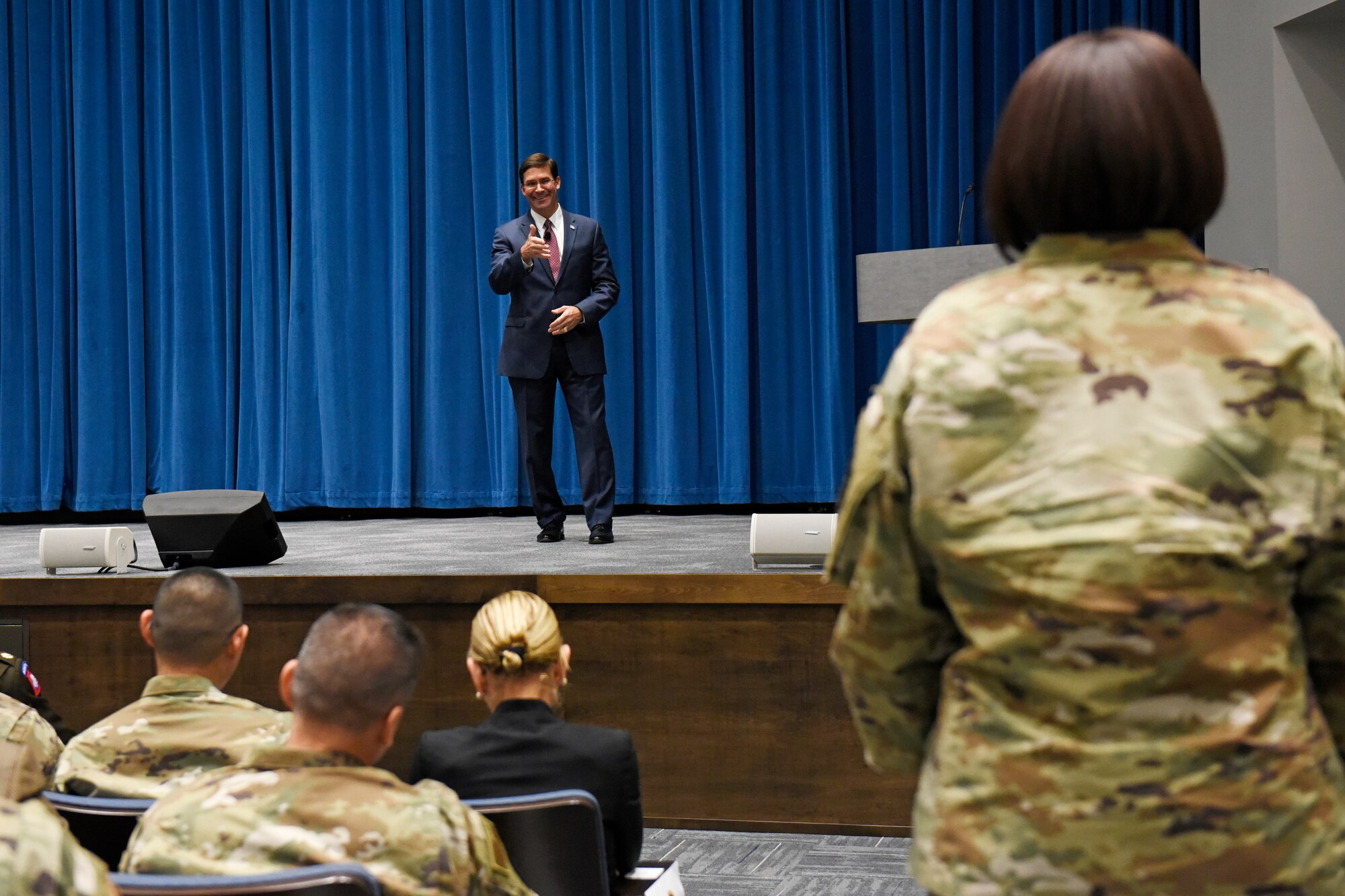 Secretary of Defense Mark T. Esper, answers questions during a town hall style meeting with members of Team Wright-Patt inside Kenney Hall at the Air Force Institute of Technology, Wright-Patterson Air Force Base, Ohio, Oct. 4, 2019. During his visit, Esper and his wife, Leah, toured several offices on base. (U.S. Air Force photo/Ty Greenlees)