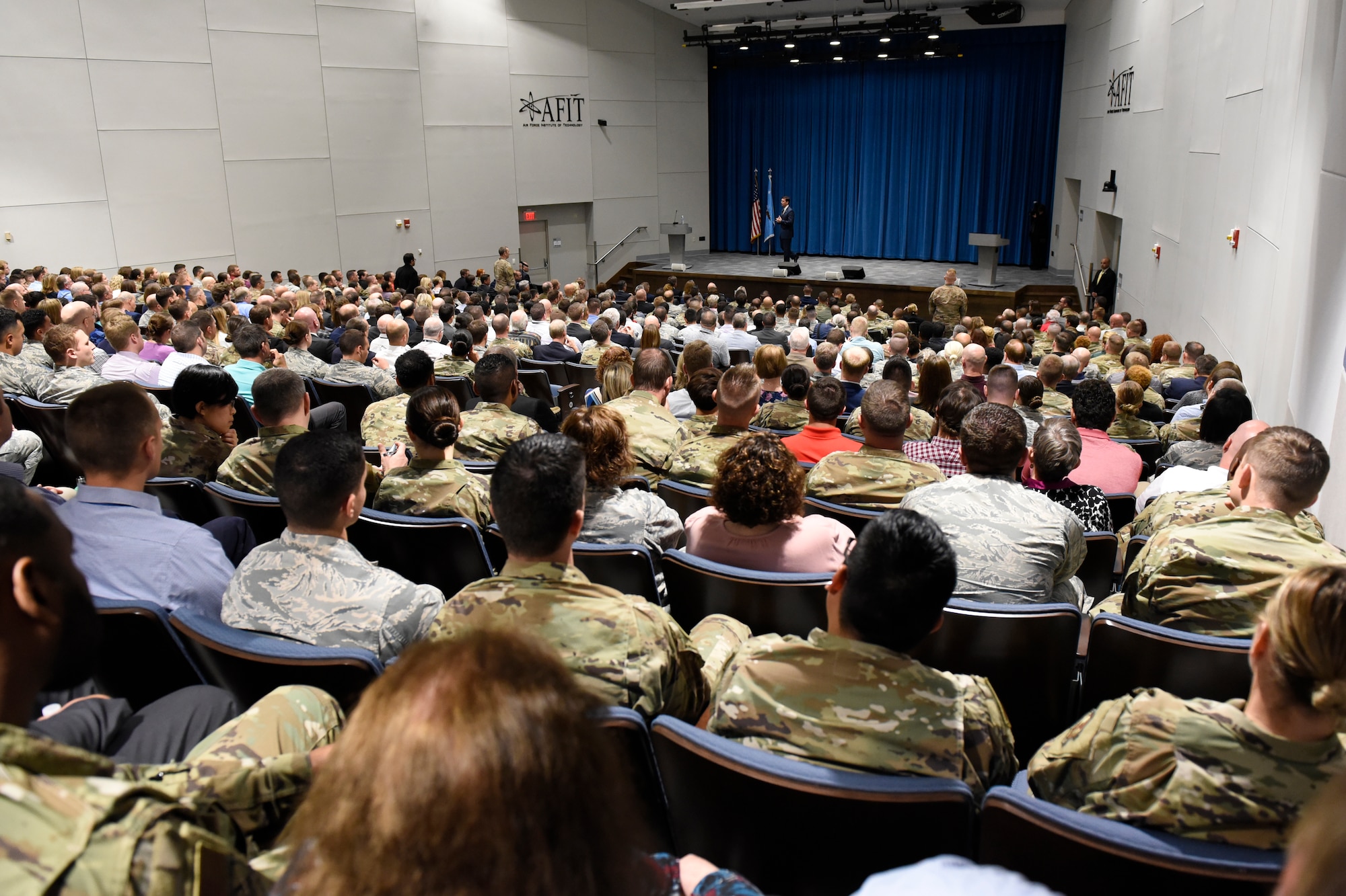 Secretary of Defense Mark T. Esper, answers questions during a town hall style meeting with members of Team Wright-Patt inside Kenney Hall at the Air Force Institute of Technology, Wright-Patterson Air Force Base, Ohio, Oct. 4, 2019. During his visit, Esper and his wife, Leah, toured several offices on base. (U.S. Air Force photo/Ty Greenlees)